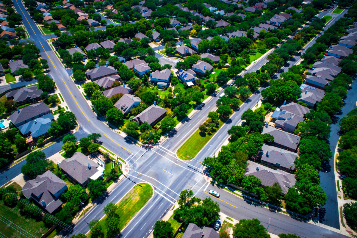 birds eye view of subdivision with houses and roadways